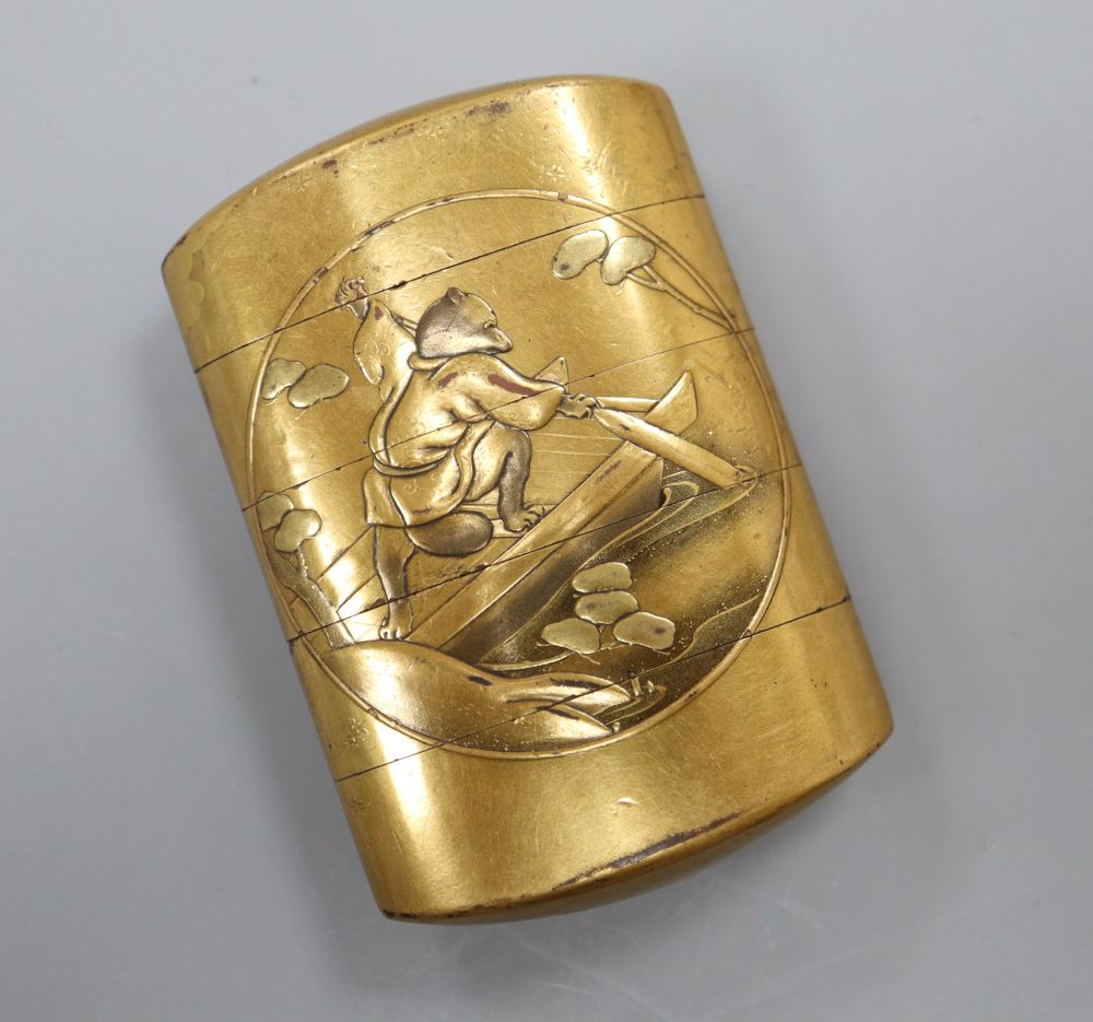 A 19th century Japanese gilt burnished lacquer Meiji period four case inro, with rabbit and bear central cartouches to both sides, sign
